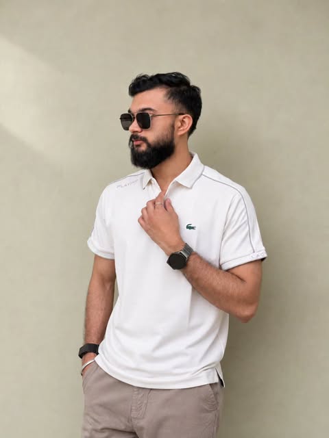 Cream polo with taupe trousers