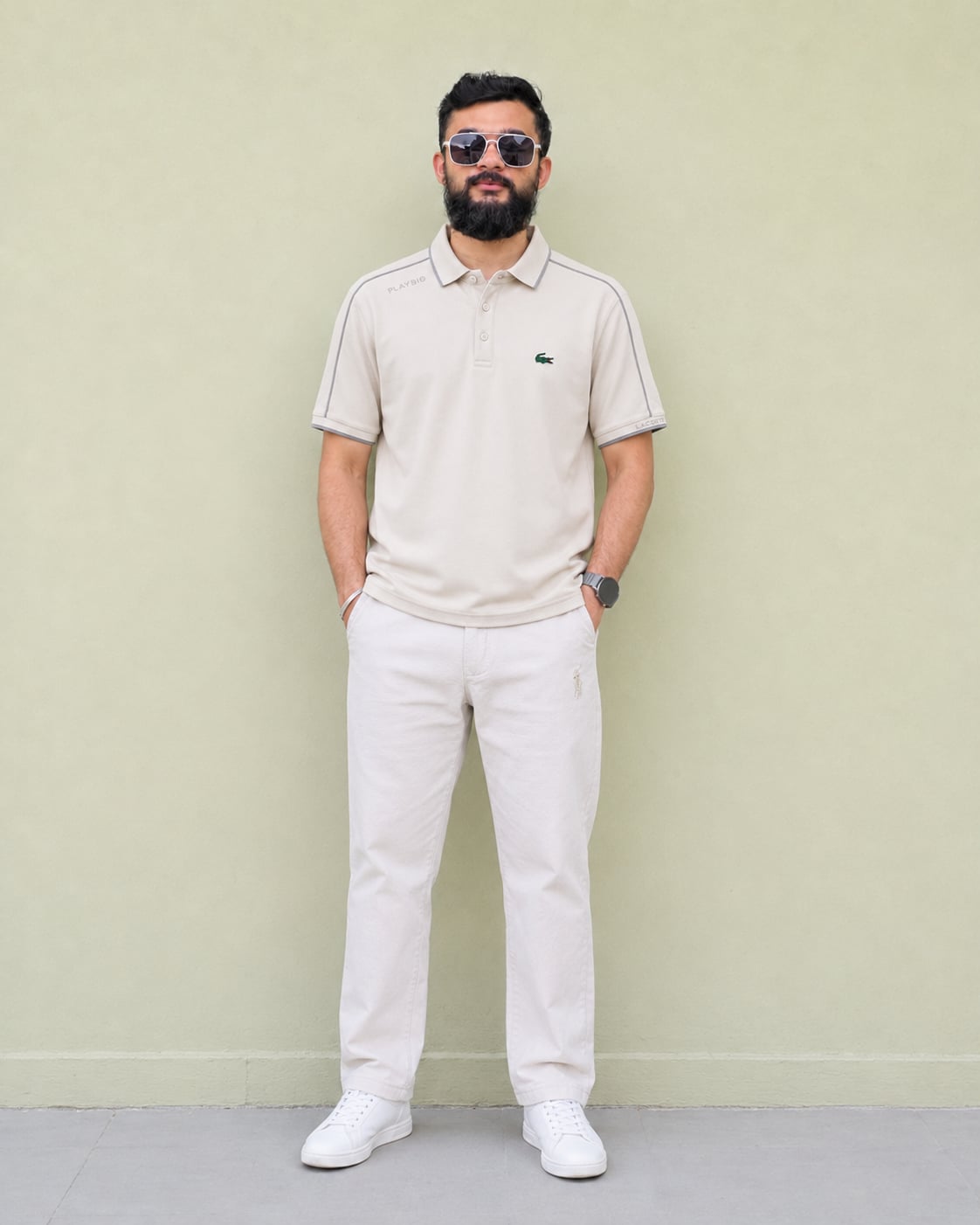 Model wearing the Cream Piped Polo with the Ivory Drawstring Linen Pants